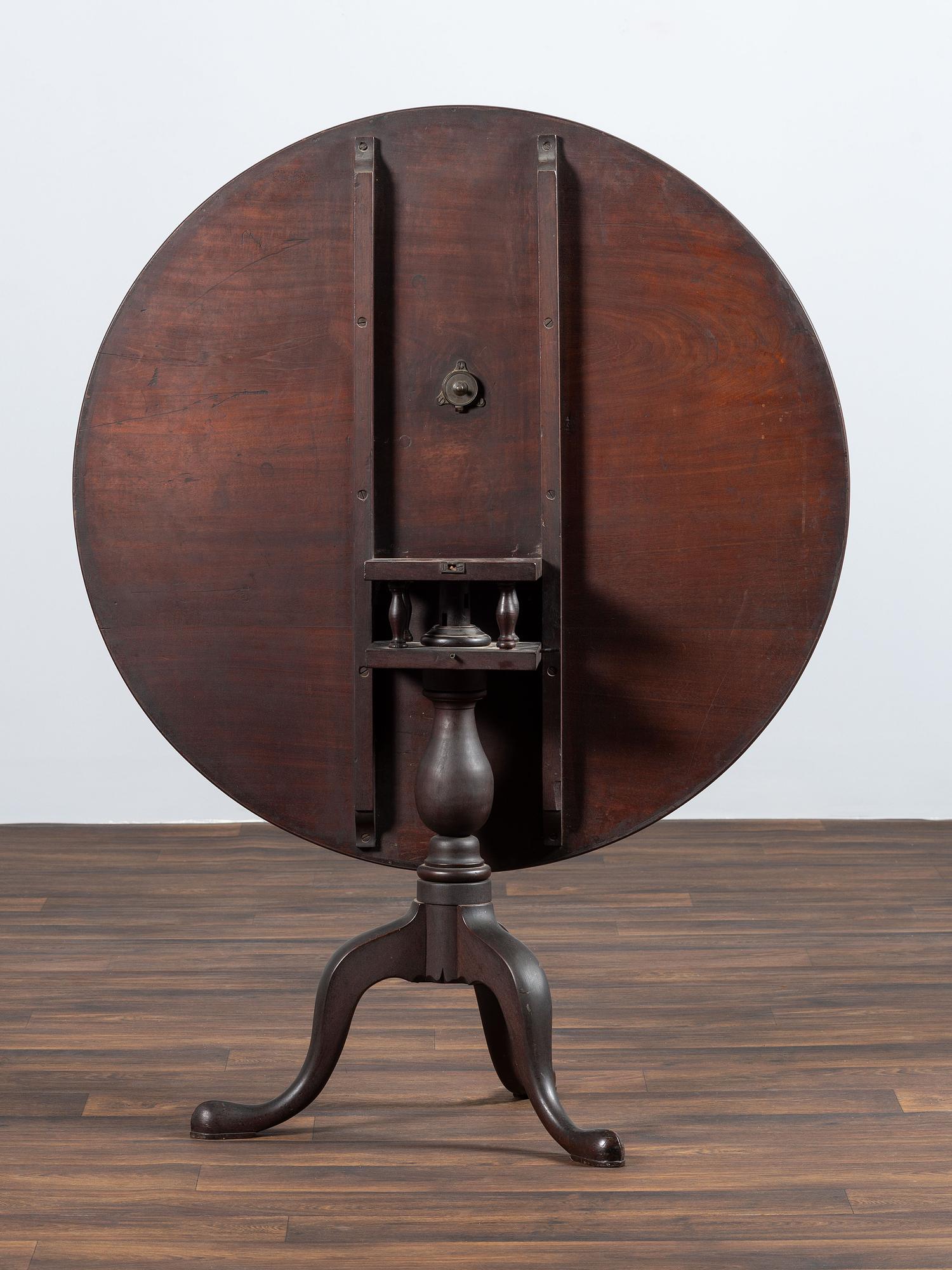 A Chippendale Turned Walnut Tilt-Tip Tea Table