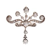 A Silver Topped 18 Karat Rose Gold and Diamond Pendant,