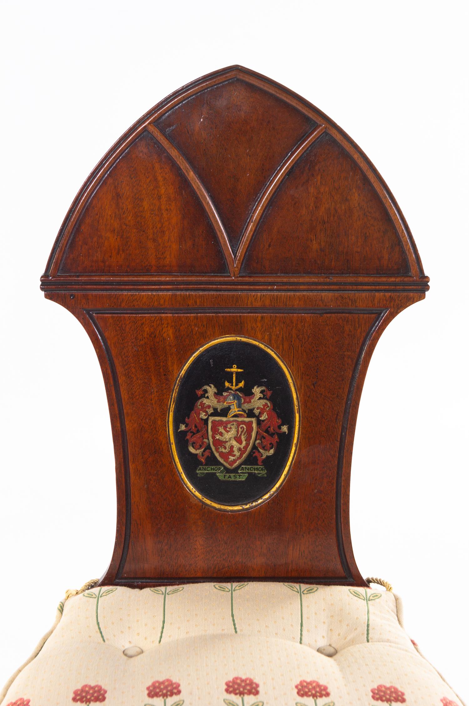 A Pair of Regency Style Mahogany Hall Chairs