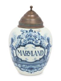 A Delftware Tobacco Jar with Brass Lid