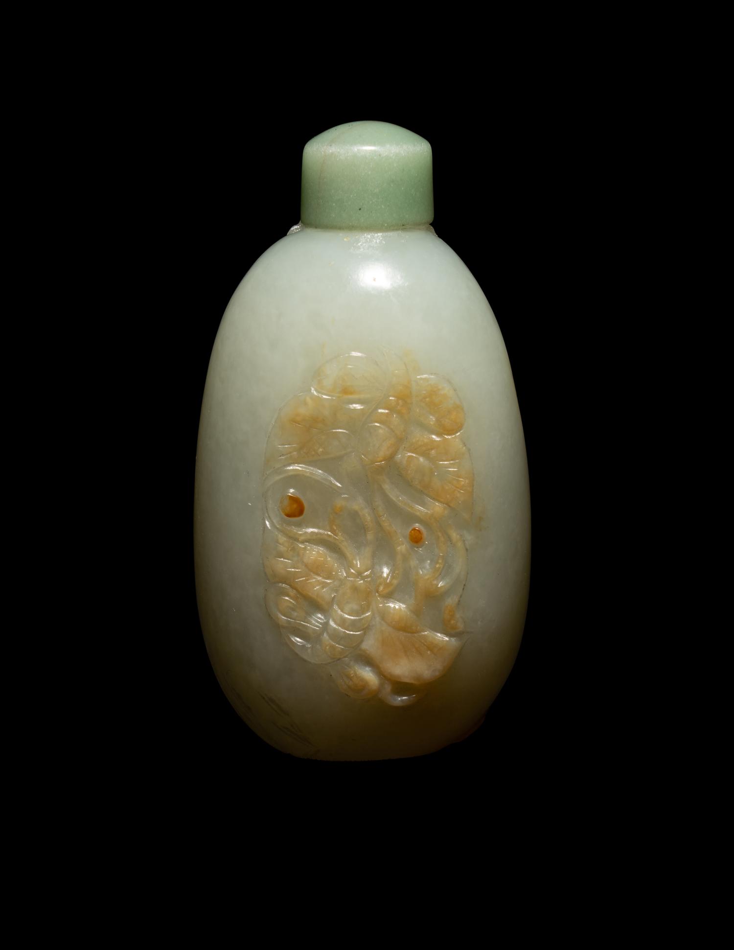A Chinese Carved Russet and Pale Celadon Jade Oval-Form 'Butterflies' Snuff Bottle
