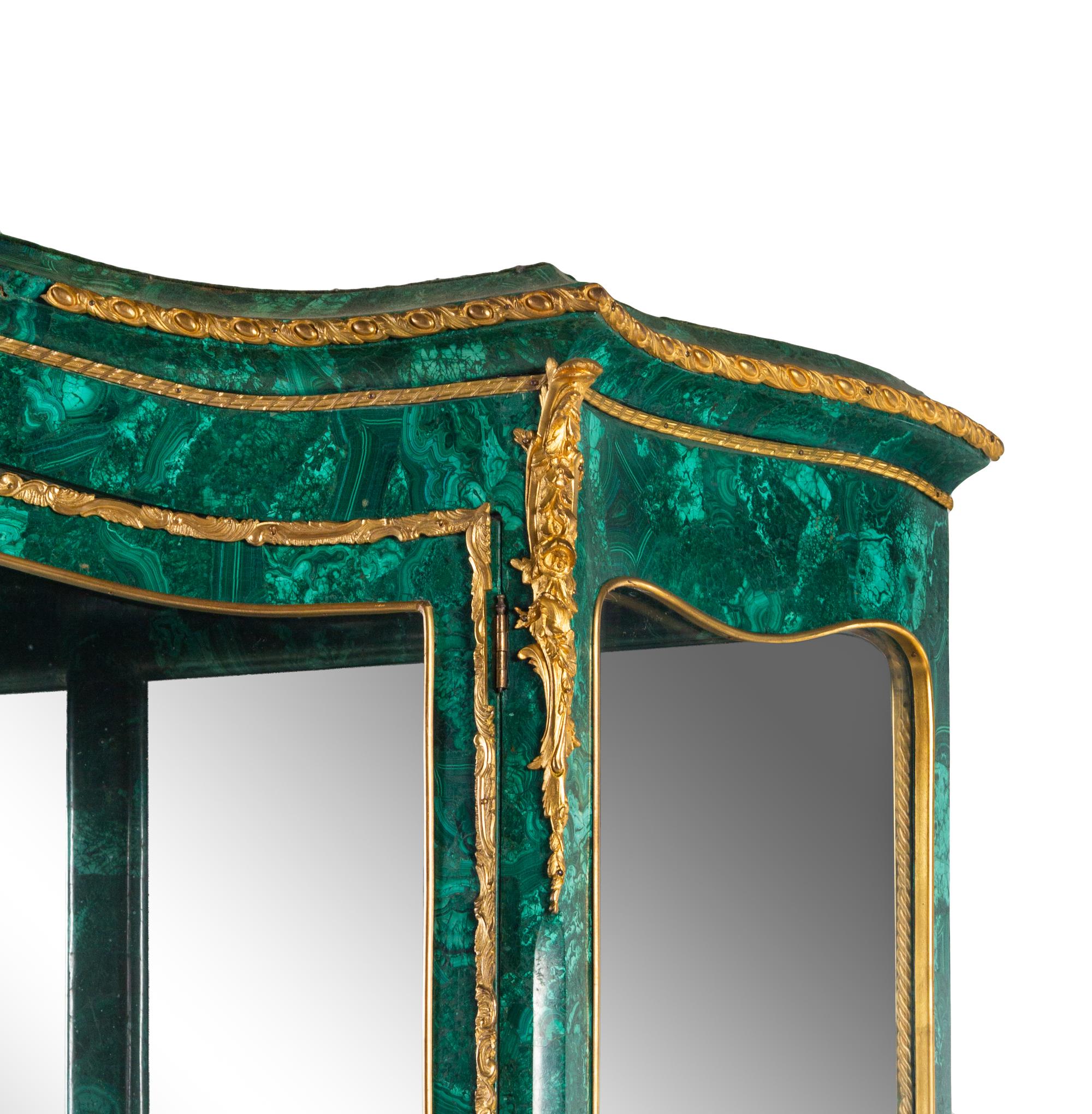 A Louis XV Style Gilt Bronze Mounted Malachite Veneered Vitrine Cabinet