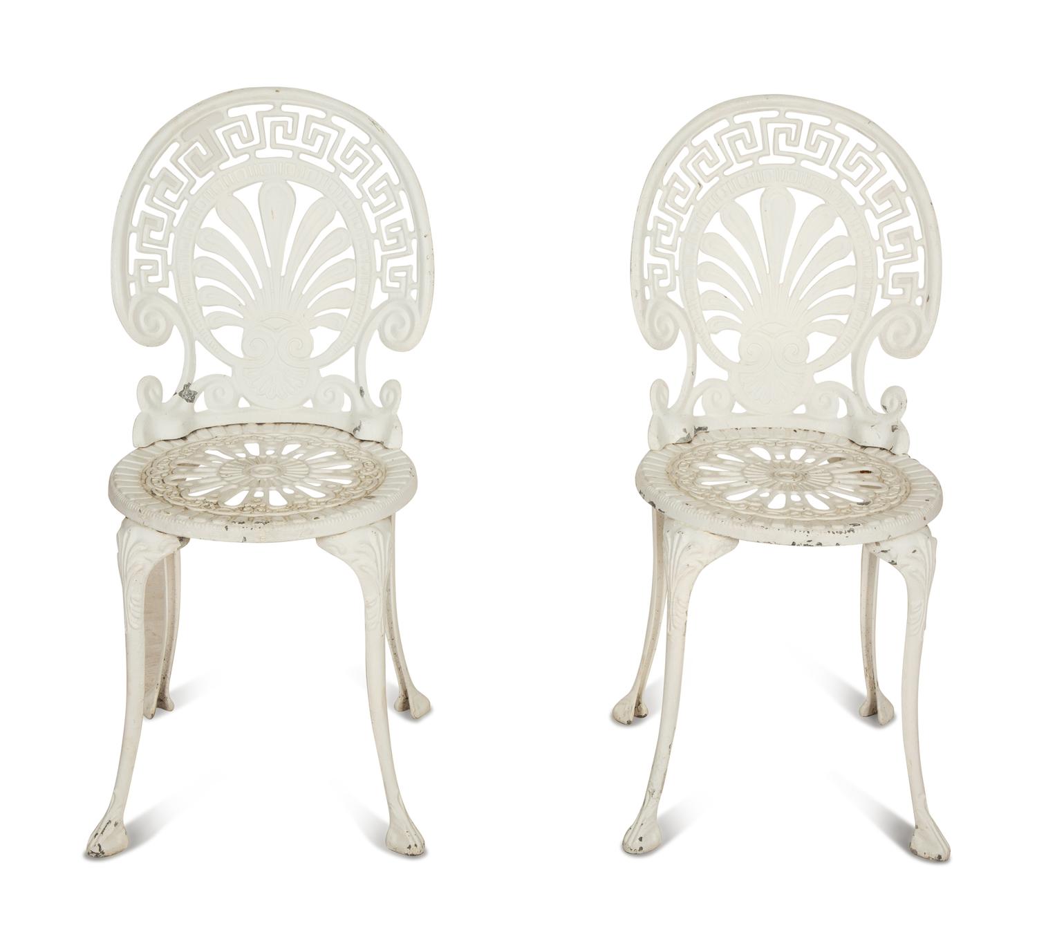 A Pair of White Painted Cast Metal Garden Chairs