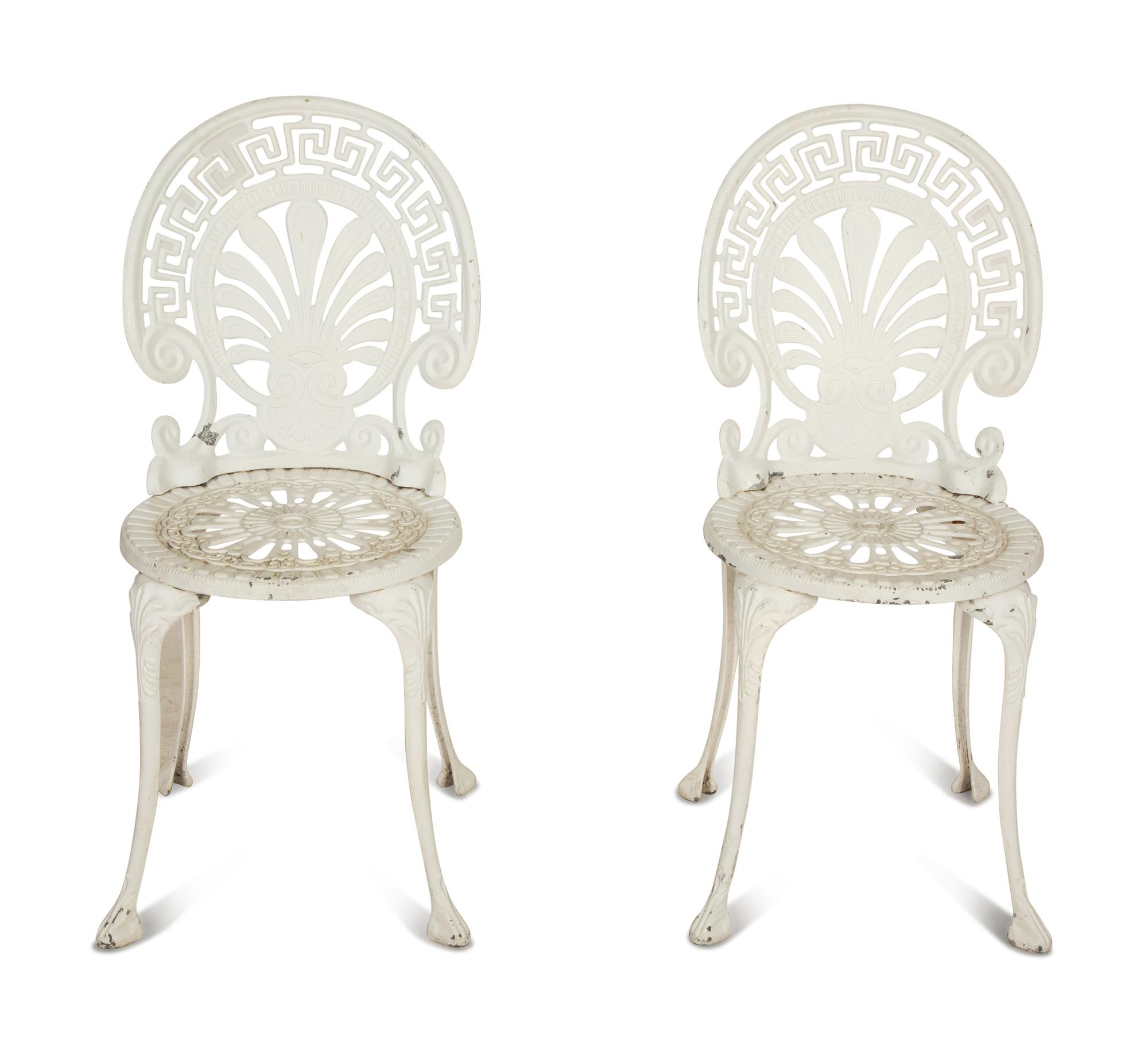 A Pair of White Painted Cast Metal Garden Chairs