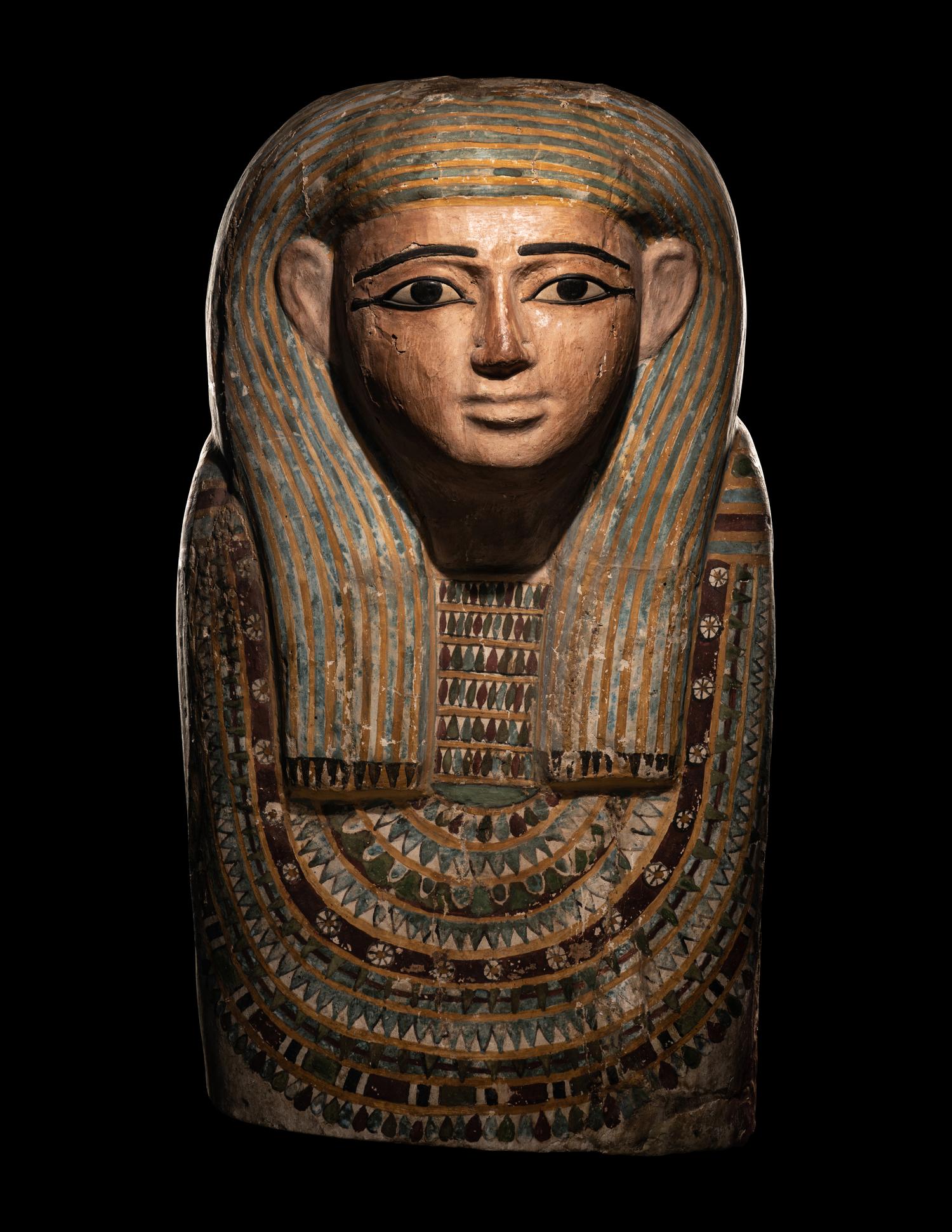 An Egyptian Polychrome Wood Mummy Mask