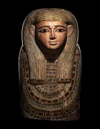 An Egyptian Polychrome Wood Mummy Mask