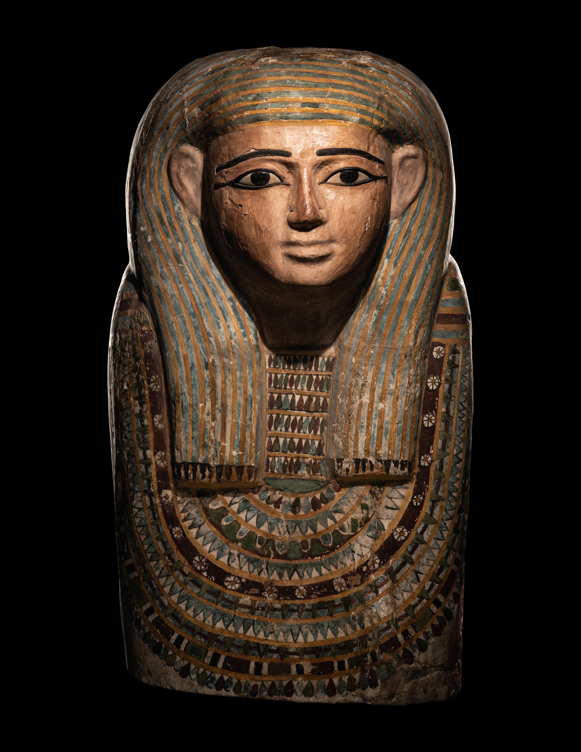 An Egyptian Polychrome Wood Mummy Mask