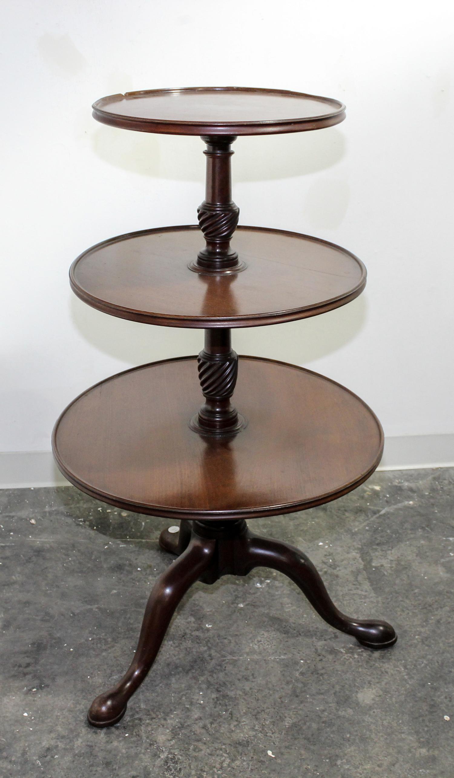 A Georgian Style Mahogany Dumbwaiter Height 41 3/4 inches. — 19TH/20TH CENTURY