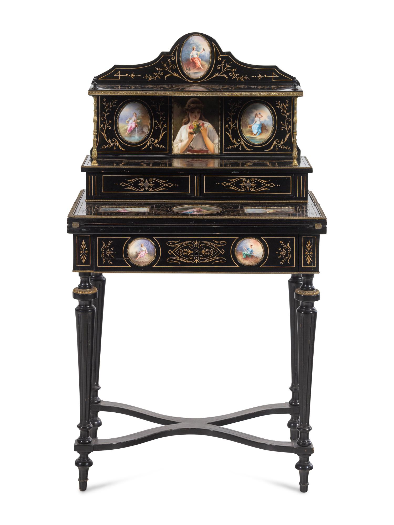 A Napoleon III Porcelain Mounted Ebonized Bonheur du Jour