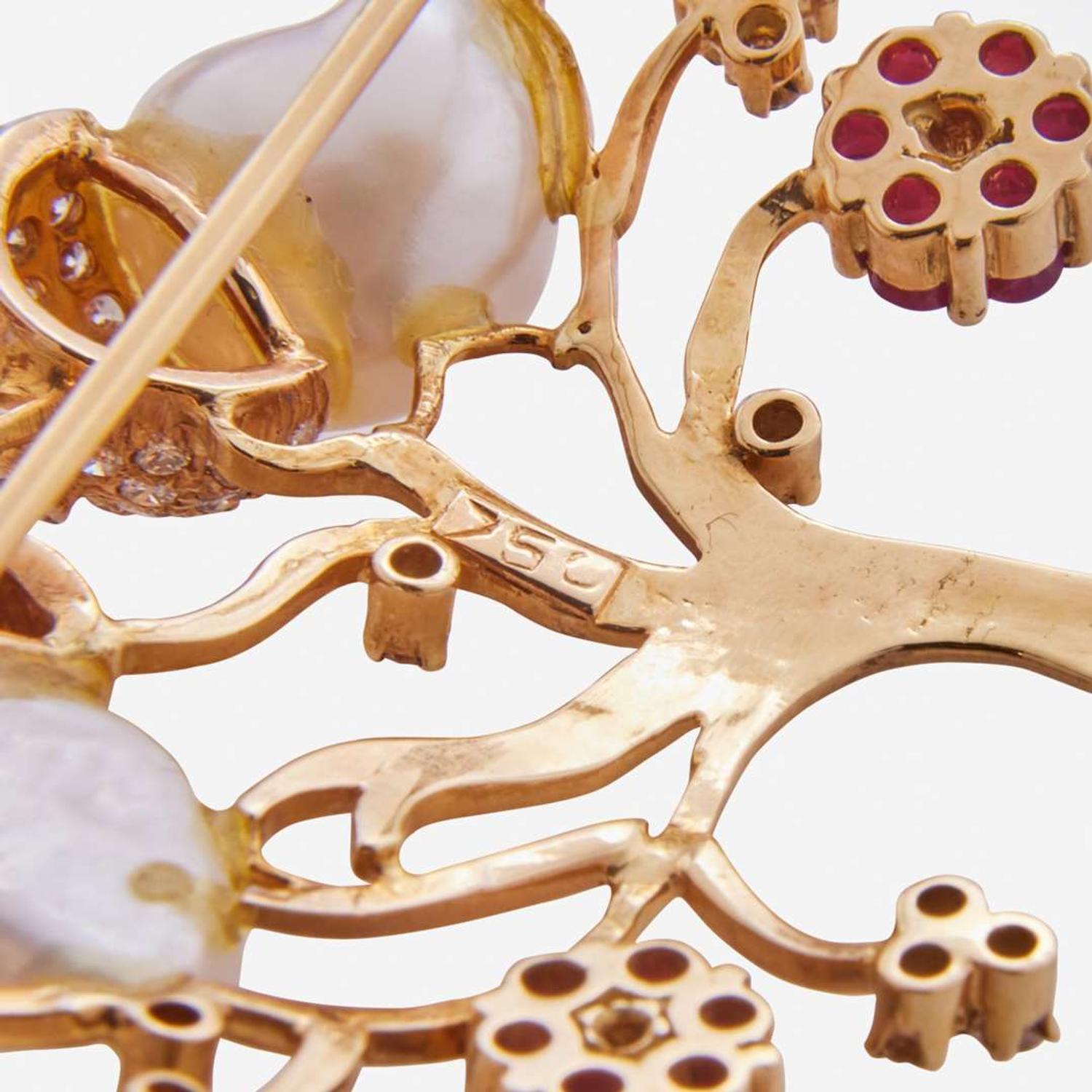 An 18K Yellow Gold, Pearl, and Ruby Brooch