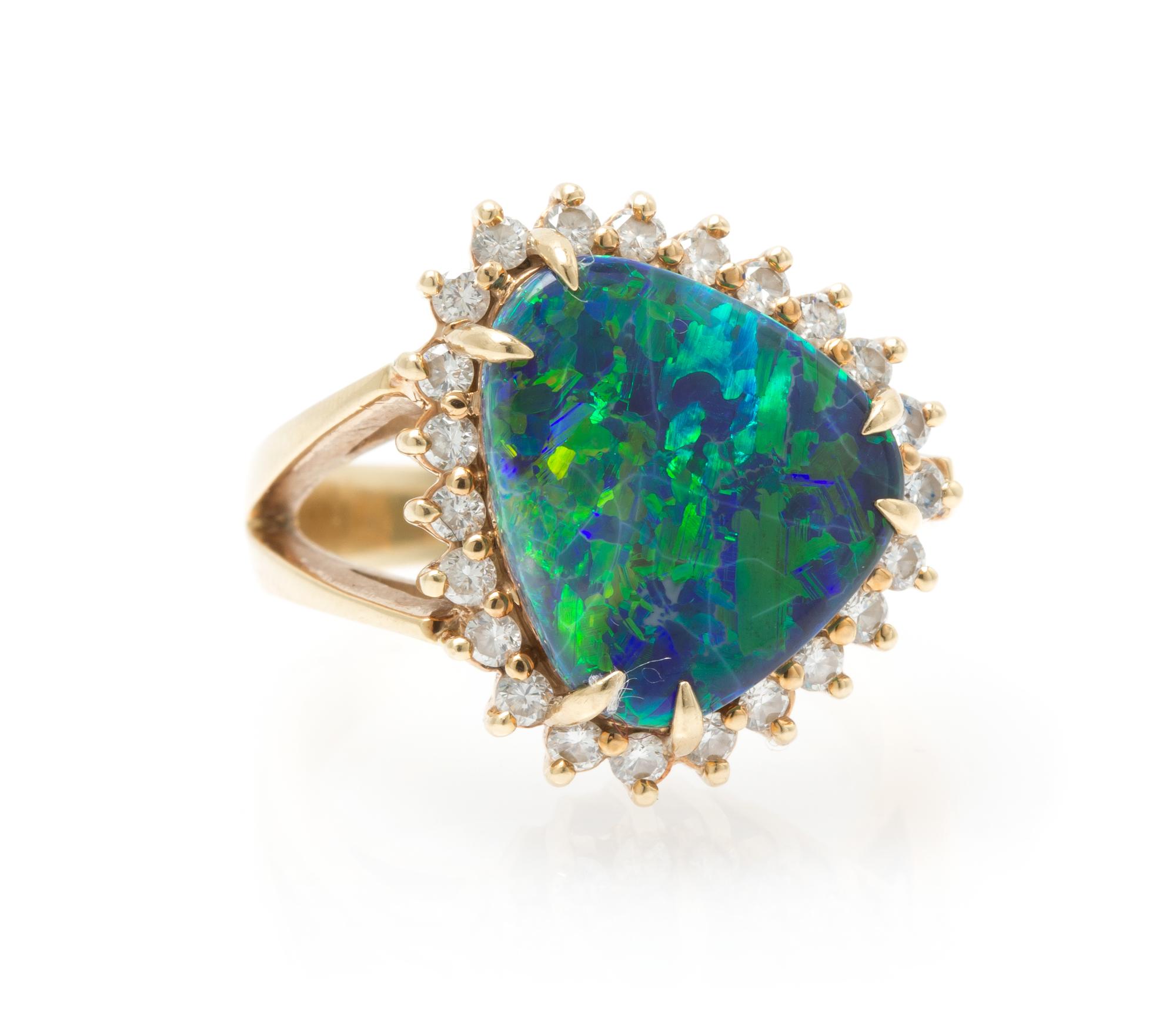A 14 Karat Yellow Gold, Black Opal and Diamond Ring, 7.30 dwts.