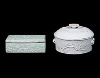 Two Chinese Carved Porcelain Covered Boxes