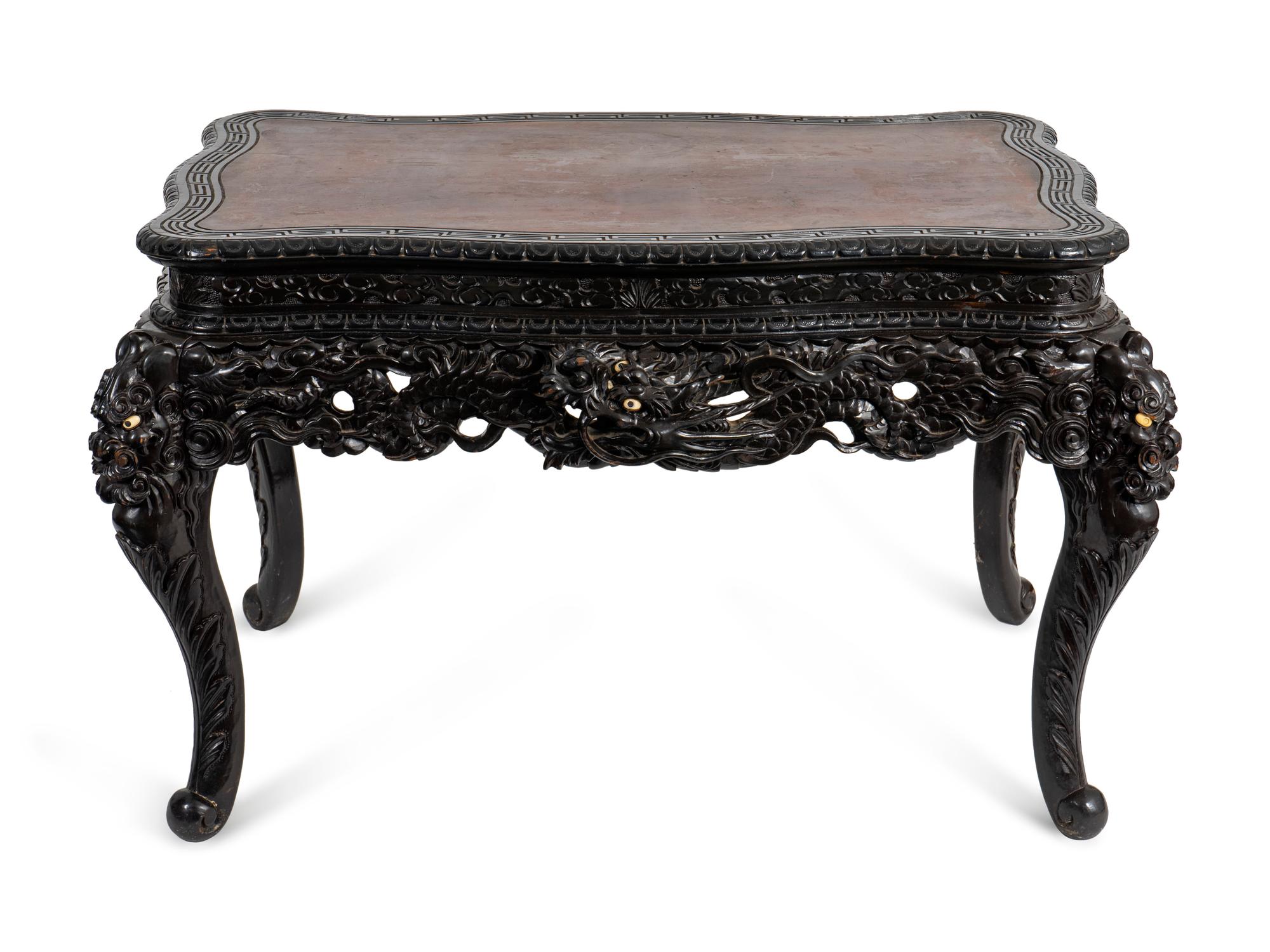 A Japanese Export Carved and Ebonized Wood Center Table — LATE 19TH/EARLY 20TH CENTURY