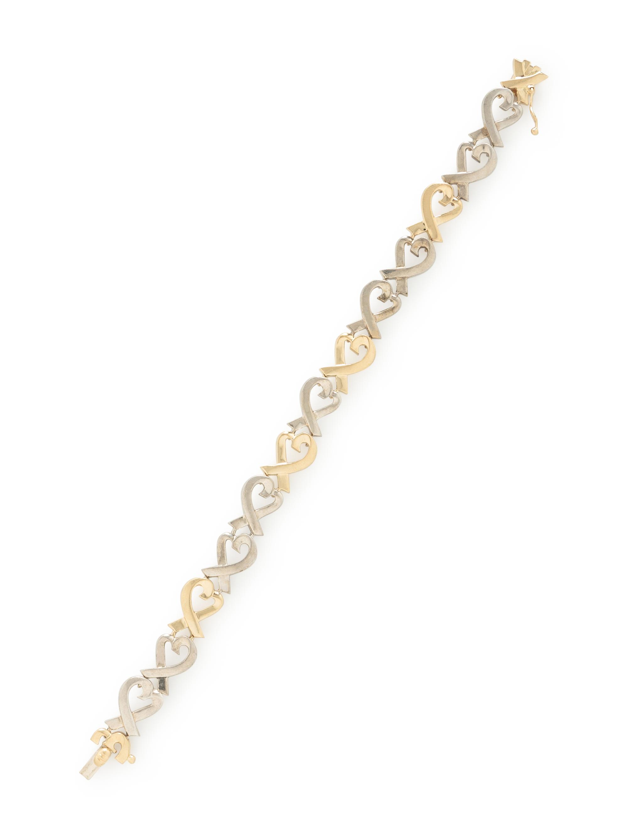 TIFFANY & CO., PALOMA PICASSO, STERLING SILVER AND YELLOW GOLD 'LOVING HEART' BRACELET