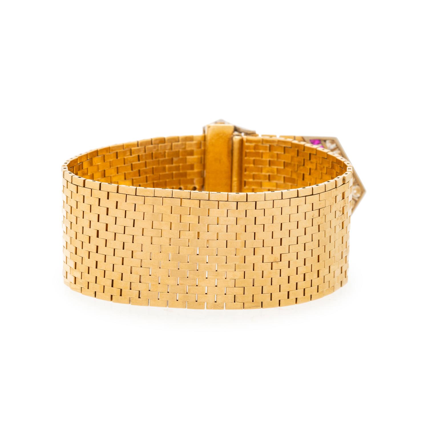 CARTIER, RETRO, YELLOW GOLD, DIAMOND AND RUBY BUCKLE BRACELET