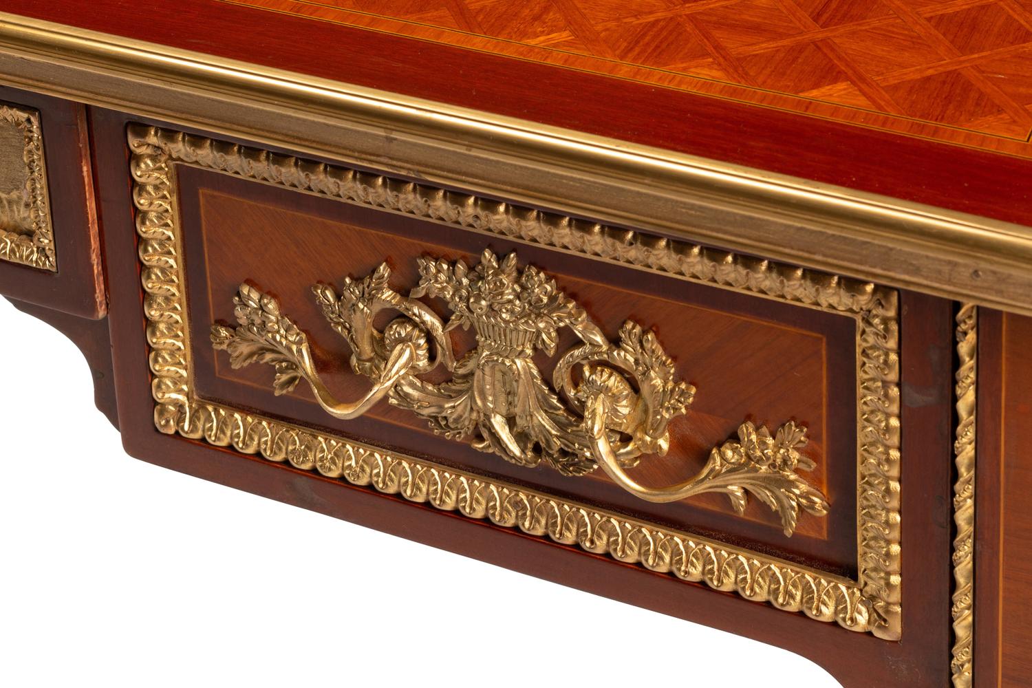 A Louis XVI Style Gilt Bronze Mounted Parquetry Bureau Plat