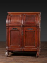 A Carved Walnut Wooton Secretary Desk