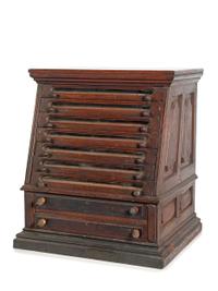 A Nine Drawer Counter Top Spool Cabinet