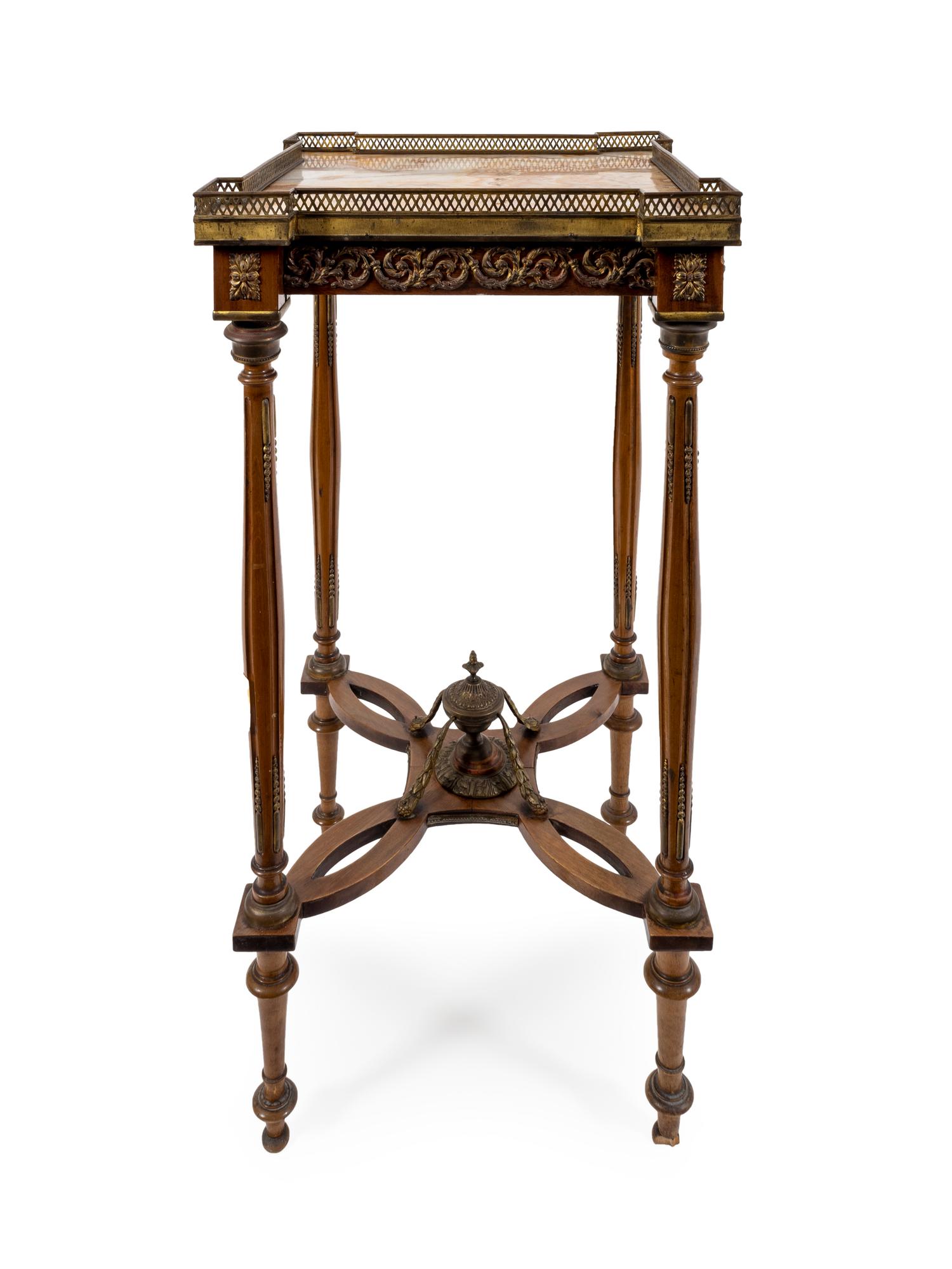 A Louis XVI Style Gilt Bronze Mounted Table — 18TH/19TH CENTURY