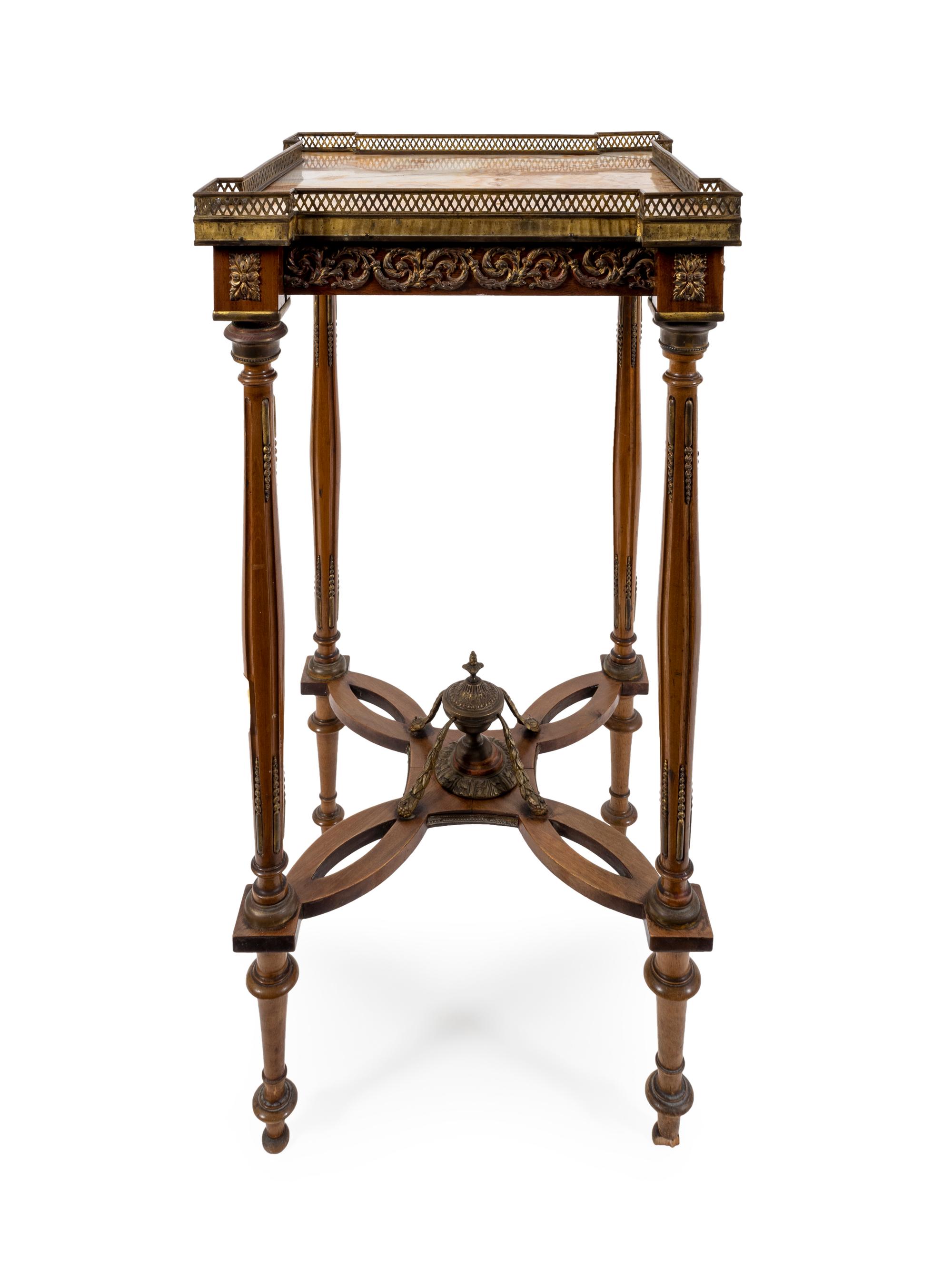 A Louis XVI Style Gilt Bronze Mounted Table — 18TH/19TH CENTURY
