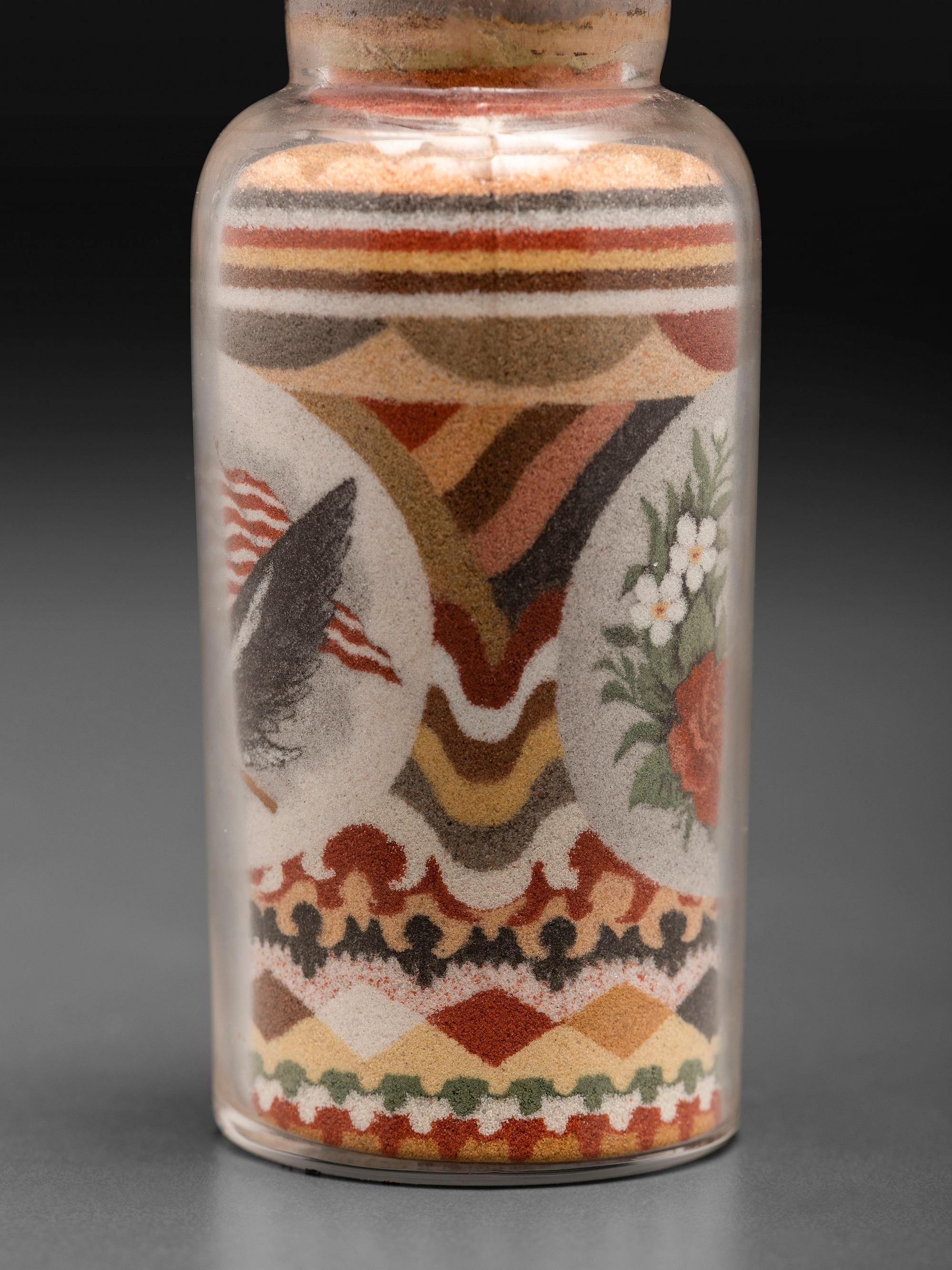 An Andrew Clemens (American, 1857-1894) Eagle Sand Bottle