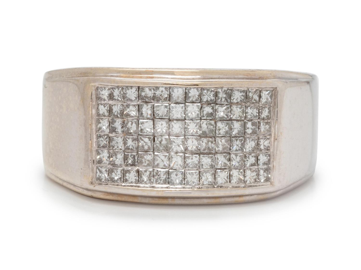 A 14 Karat White Gold and Diamond Ring,