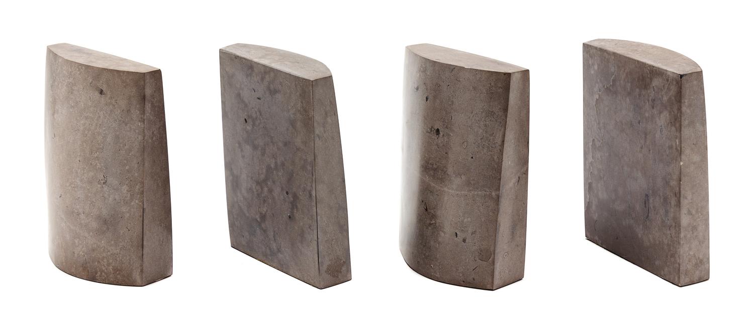 [BOOKENDS]. Two pair of grey soapstone bookends. Height of each, 8-in.