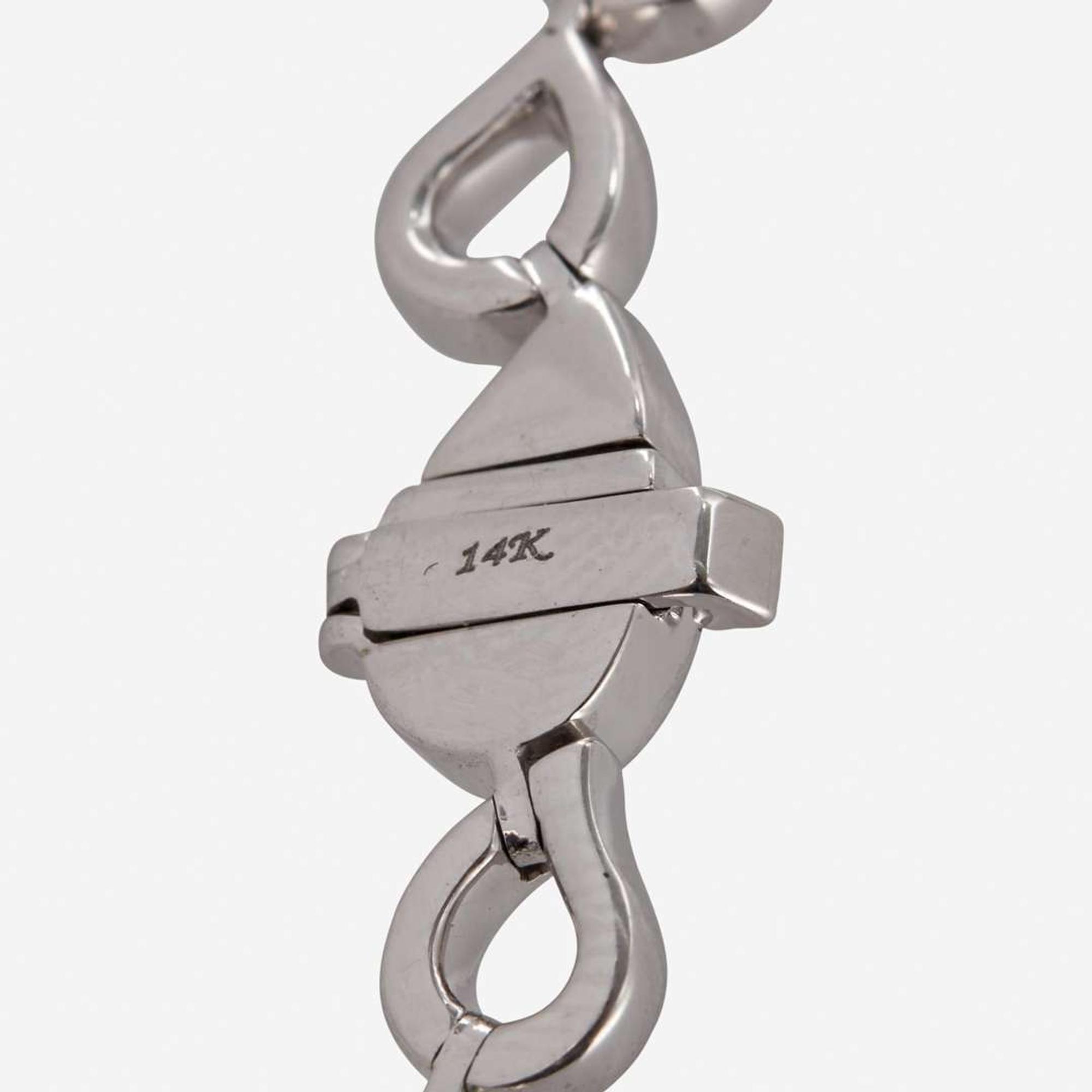 A 14K White Gold, Emerald, and Diamond Necklace