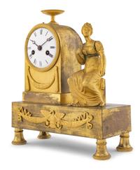 An Empire Gilt Bronze Clock