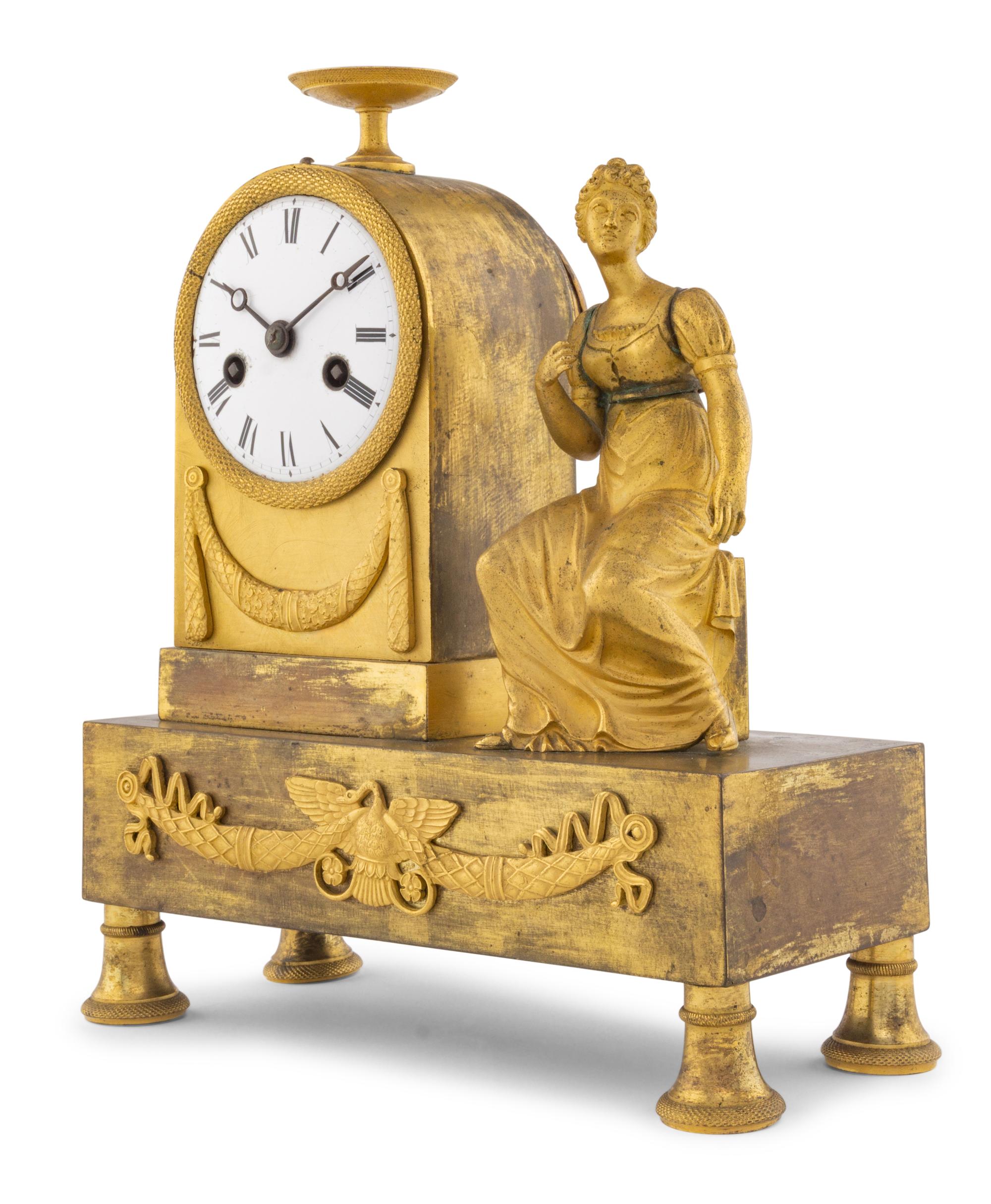 An Empire Gilt Bronze Clock