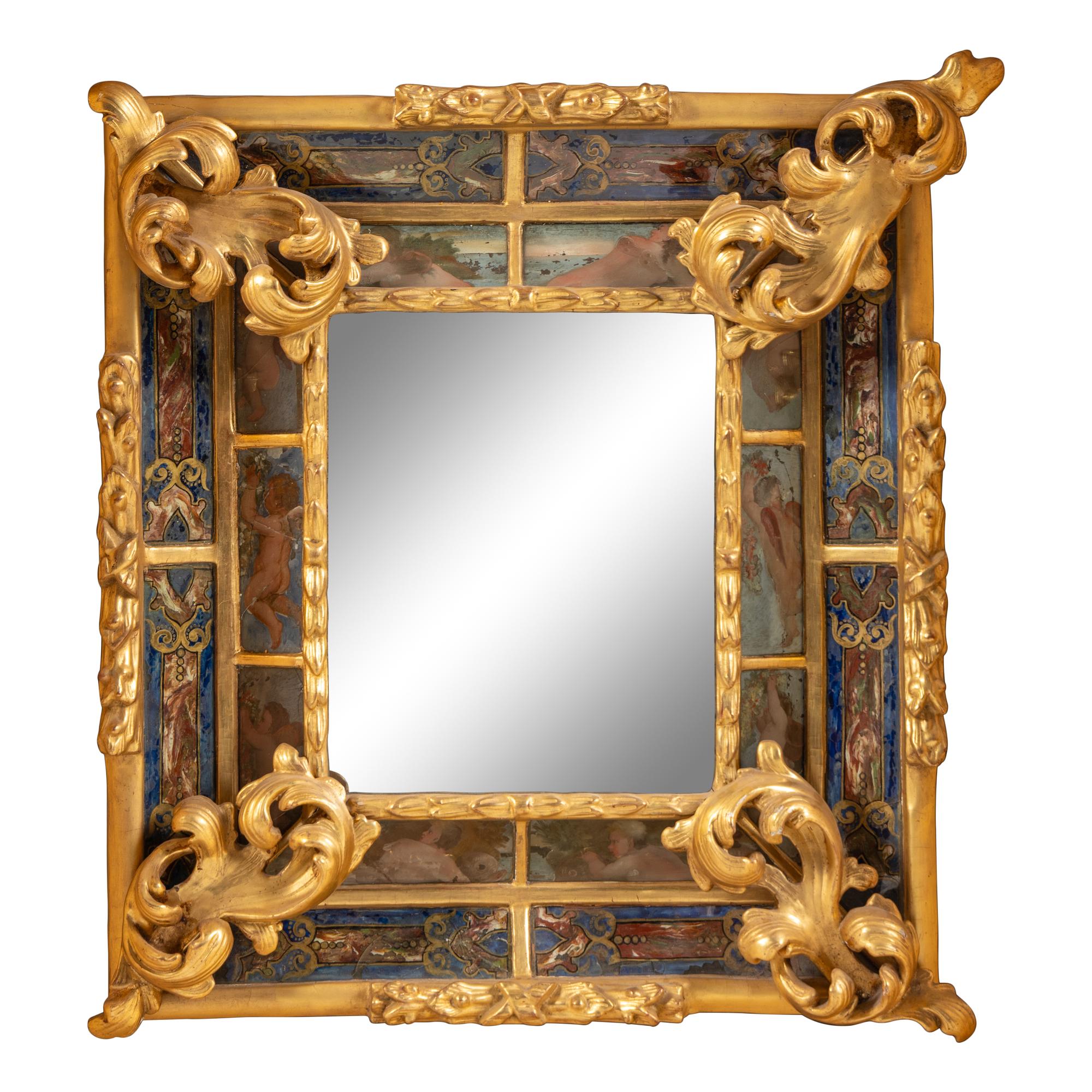 A Flemish Ebonized, Parcel Gilt and Reverse Painted Mirror