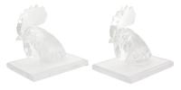 A Pair of Lalique Tete de Coq Molded and Frosted Glass Bookends Height 7 3/4 inches. — 20TH CENTURY