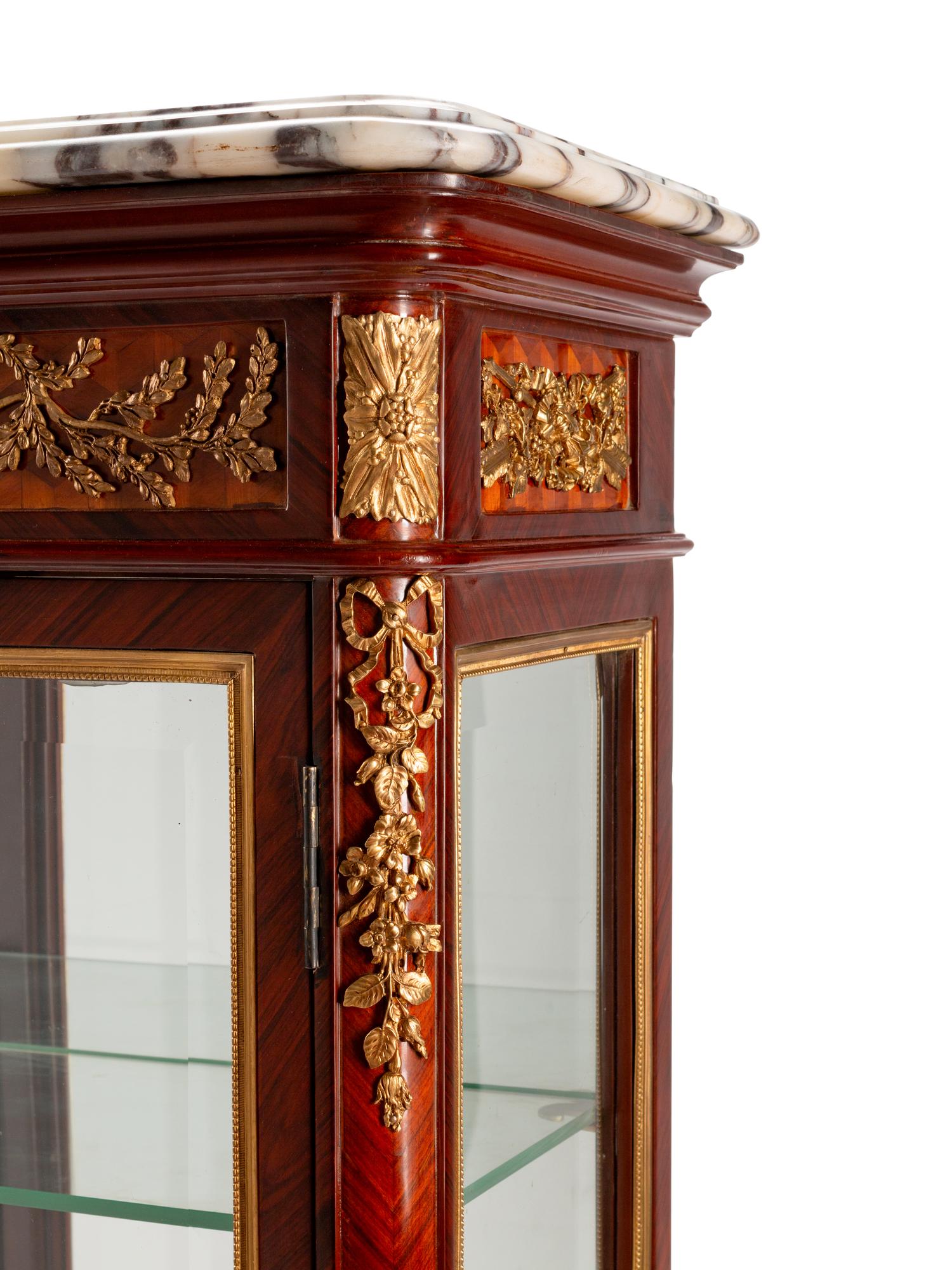 A Louis XV/XVI Transitional Style Gilt-Bronze-Mounted Kingwood and Tulipwood Vitrine