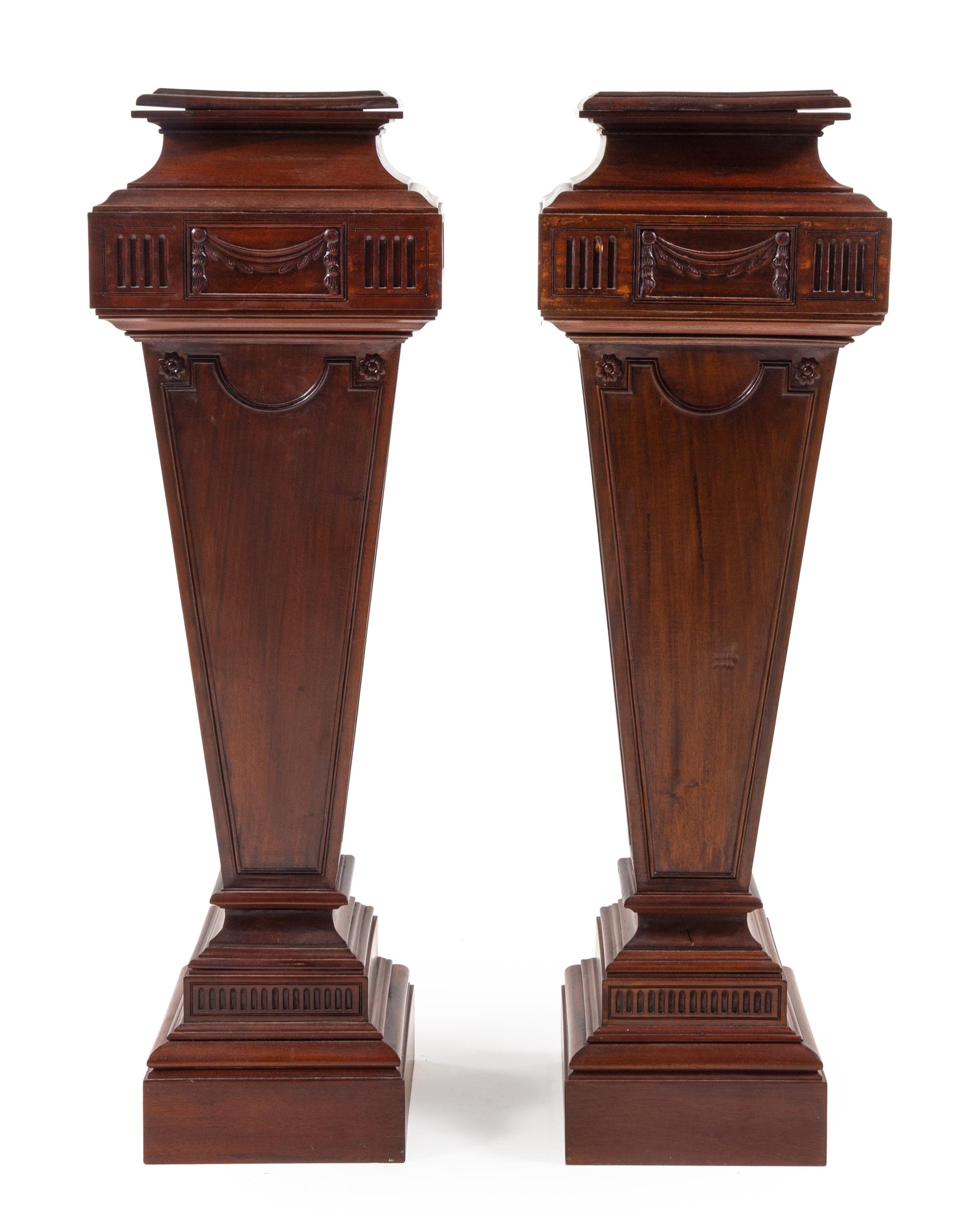 A Pair of Adam Style Mahogany Pedestals Height 48 inches. — 20TH CENTURY