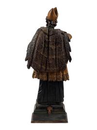 An Italian Carved and Painted Saint Figure and Stand