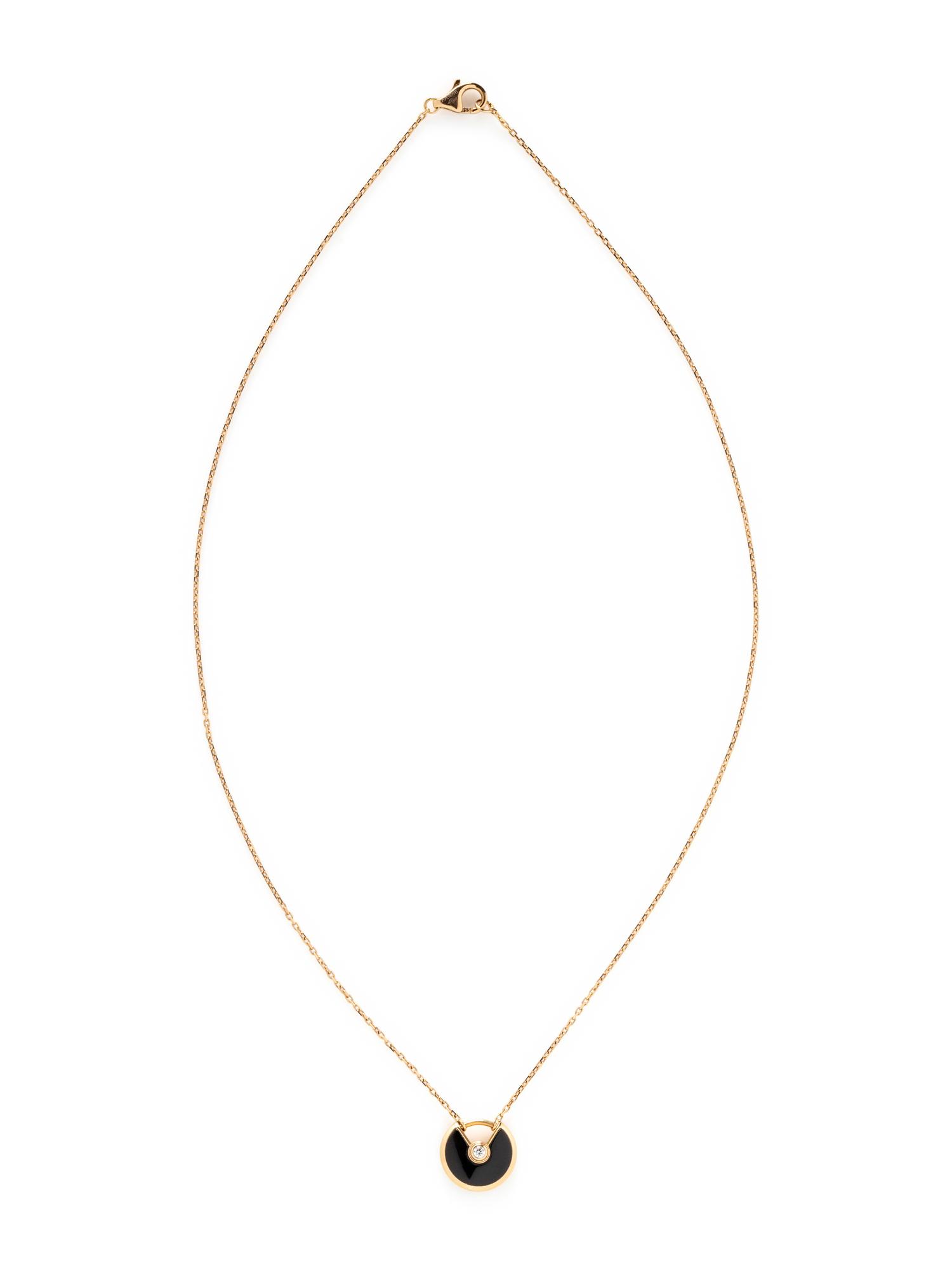 CARTIER, ROSE GOLD, ONYX, AND DIAMOND 'AMULETTE DE CARTIER' NECKLACE