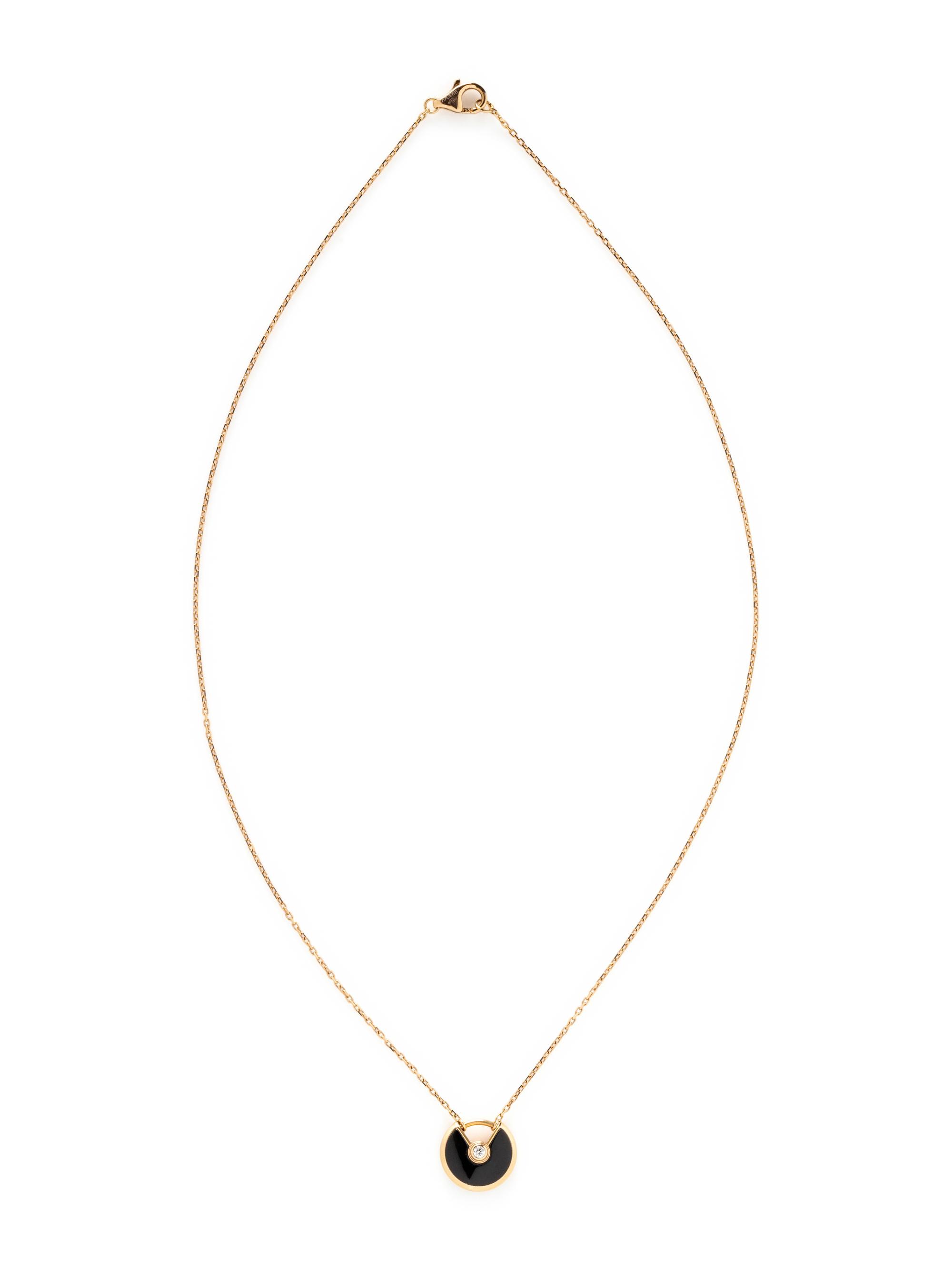 CARTIER, ROSE GOLD, ONYX, AND DIAMOND 'AMULETTE DE CARTIER' NECKLACE