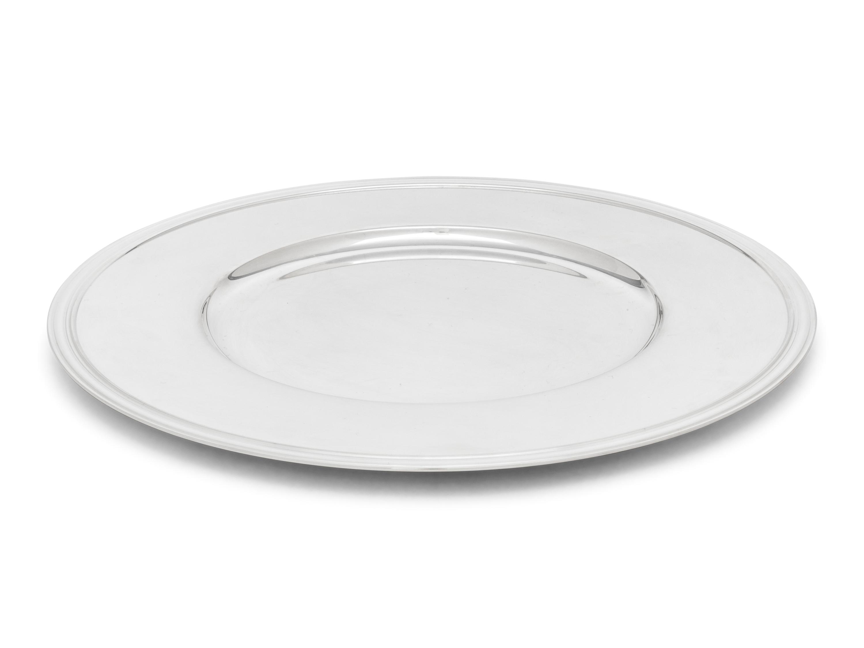 A Set of Thirteen Christofle Silver-Plate Chargers