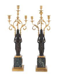 A Pair of Empire Gilt and Patinated Bronze and Marble Three-Light Figural Candelabra