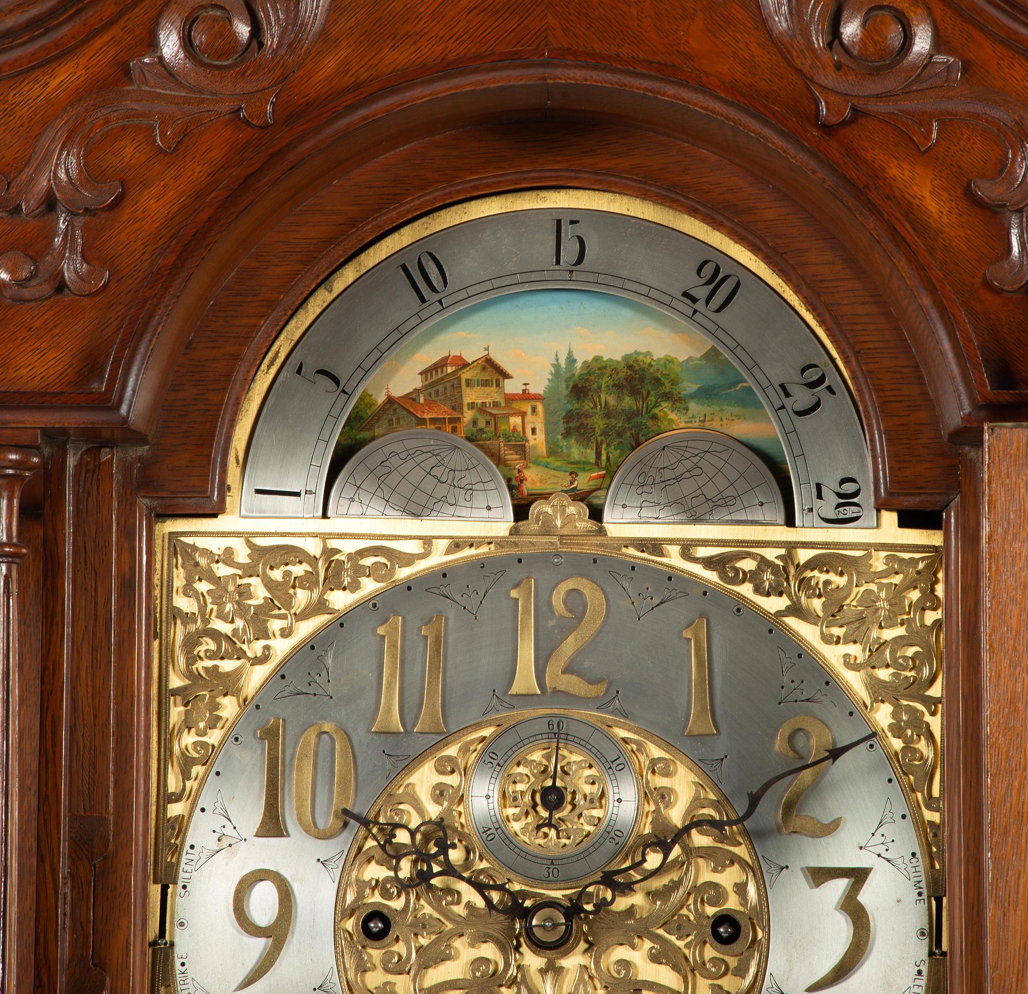 A Winterhalder and Hofmeier Oak Tall Case Clock