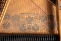 A Steinway and Sons Mahogany Baby Grand Piano