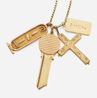 A collection of four gold necklaces