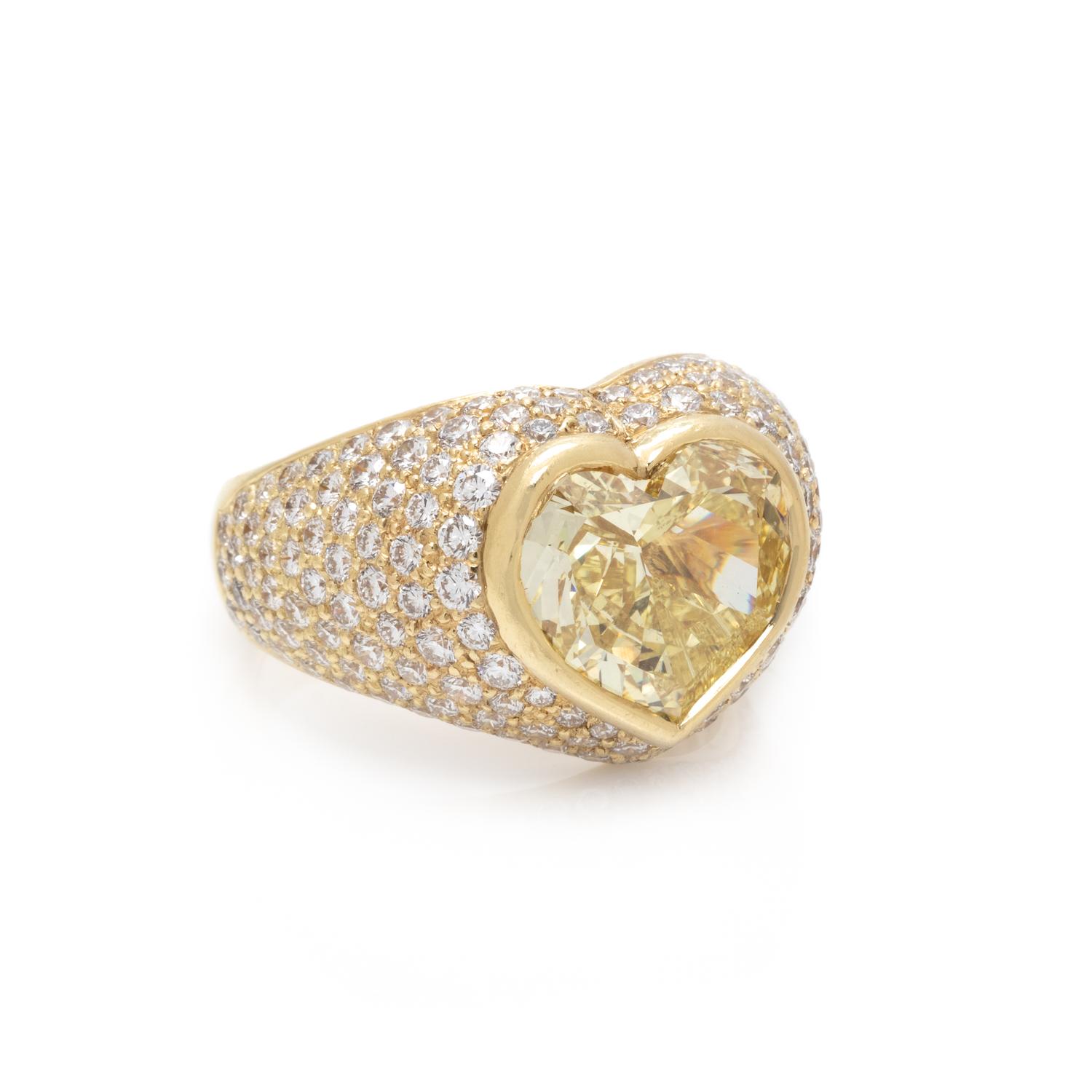 FANCY INTENSE YELLOW DIAMOND AND DIAMOND RING