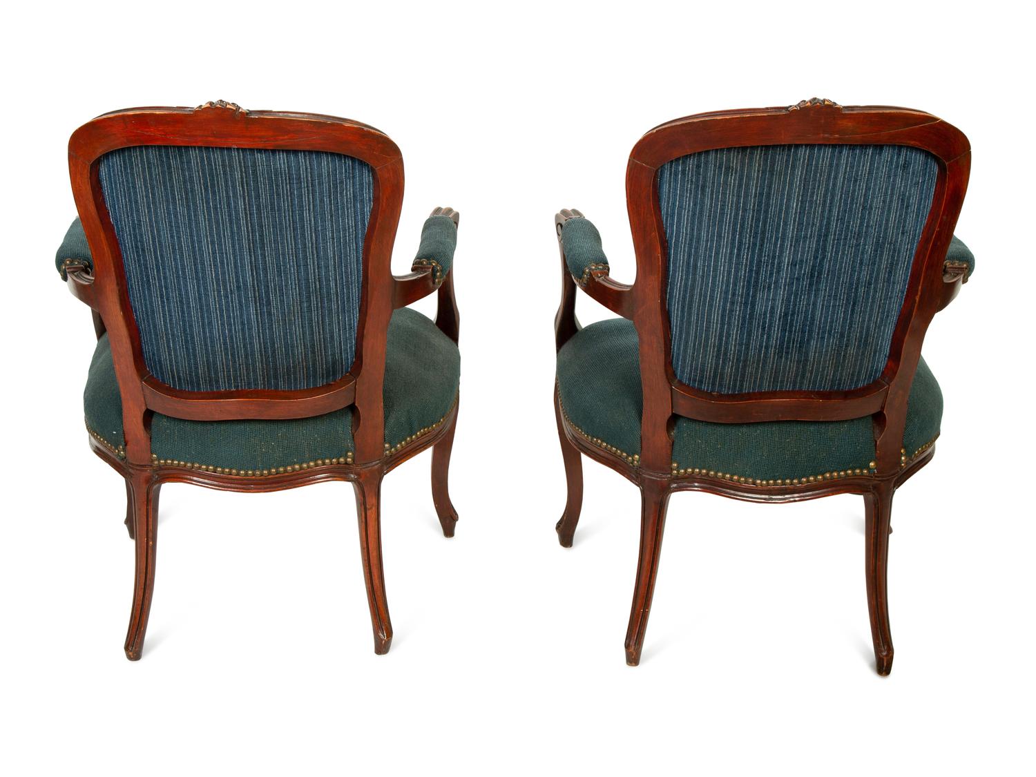 A Pair of Louis XV Style Walnut Fauteuils