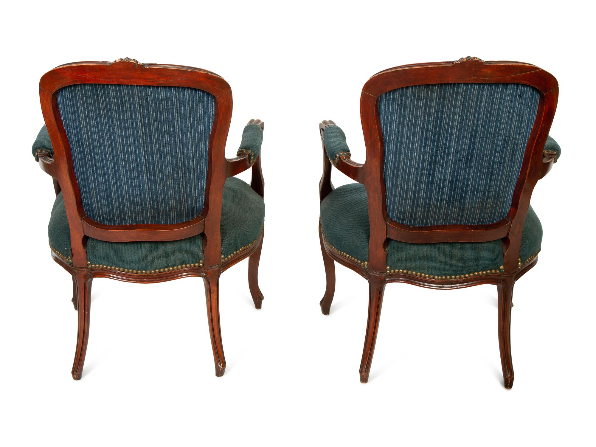 A Pair of Louis XV Style Walnut Fauteuils