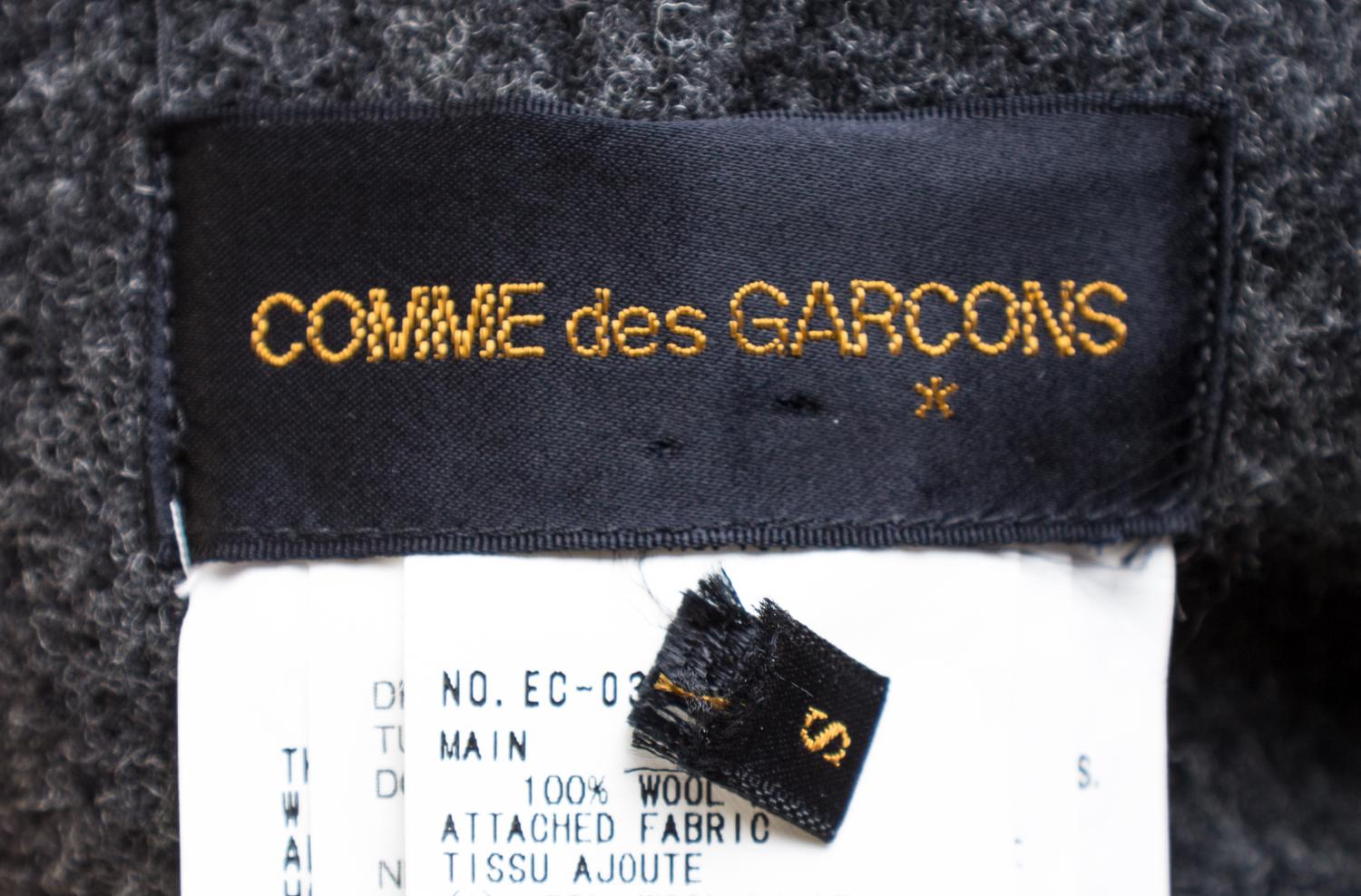 A Comme des Garcons Gray Flannel Inside Out Trench Coat, Size small.
