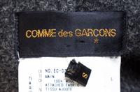 A Comme des Garcons Gray Flannel Inside Out Trench Coat, Size small.