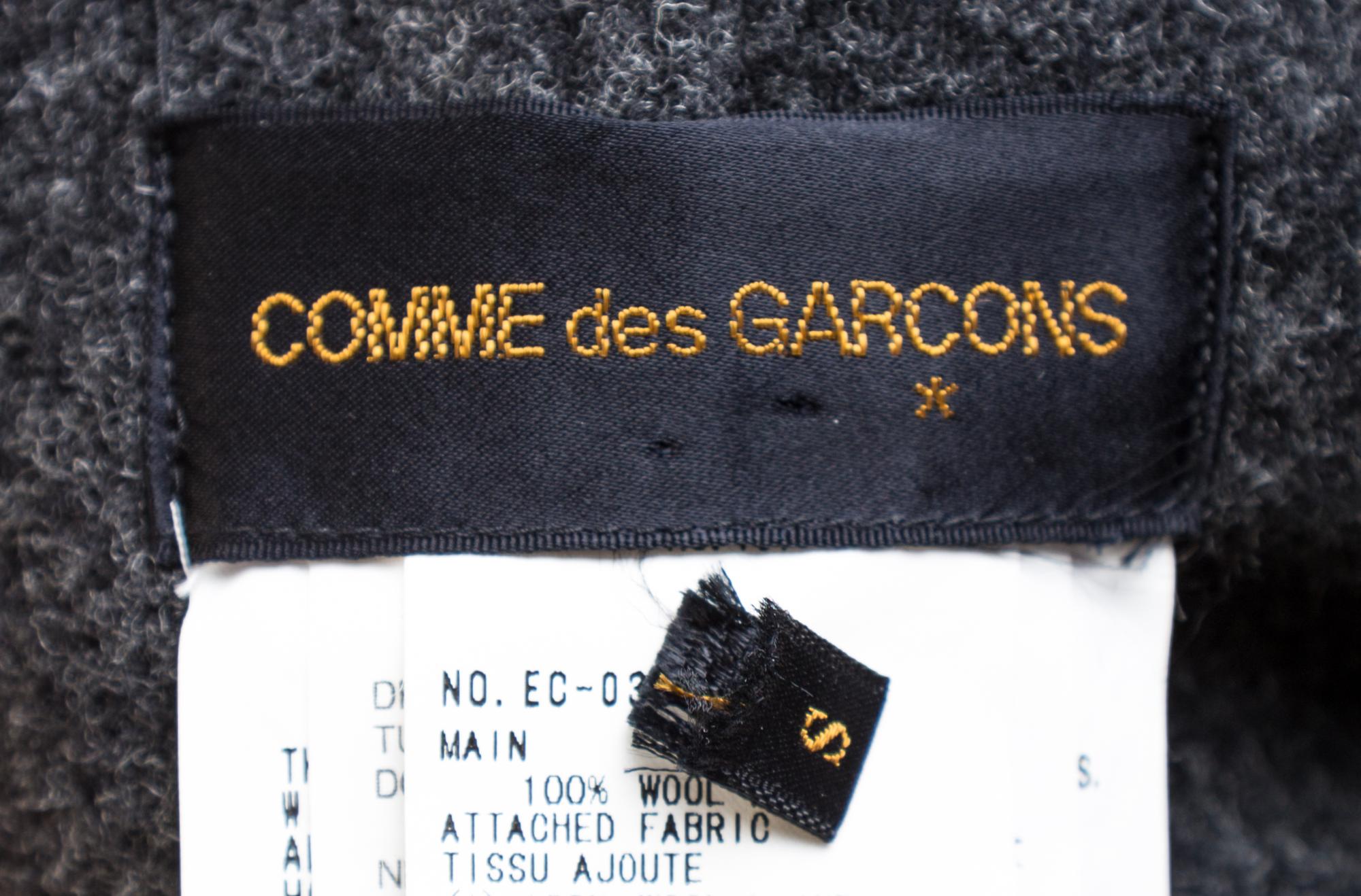 A Comme des Garcons Gray Flannel Inside Out Trench Coat, Size small.