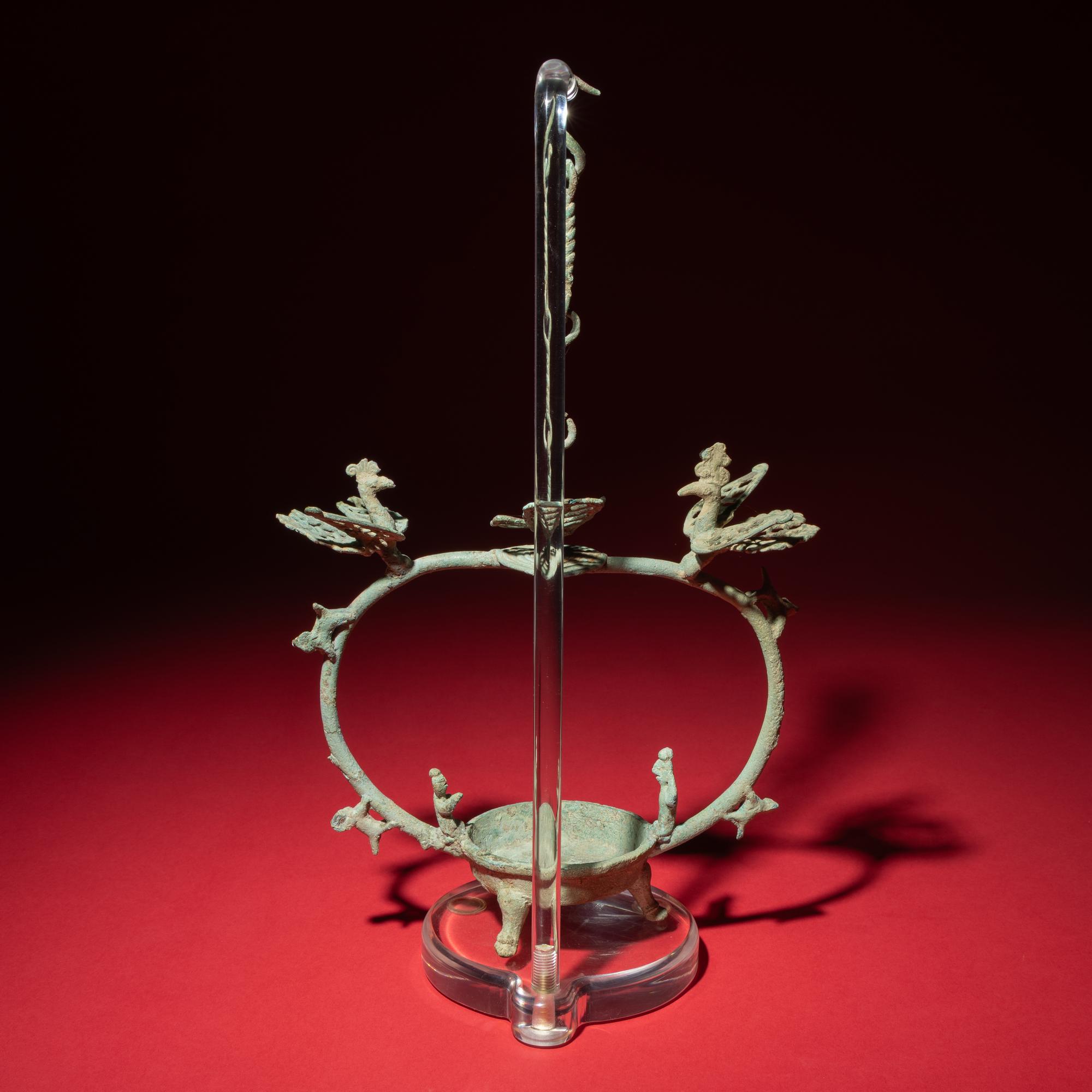 A Chinese Bronze 'Phoenix and Immortal' Hanging Oil Lamp, Eastern Han Dynasty — 東漢 青銅龍鳳神人懸燈