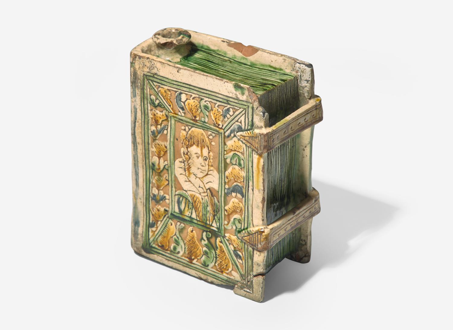 A Continental Faience Pottery Book-Form Flask